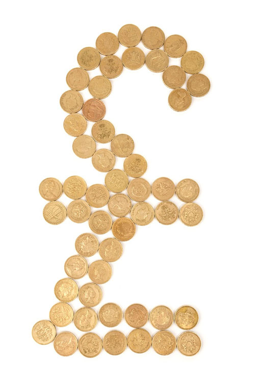 Image of pound coins in shape of sterling symbol Image of pound coins in shape of sterling symbol